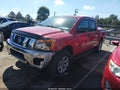 2011 Nissan Titan — photo 2 of 16 | VIN 1N6BA0ECXBN300186