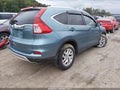 2016 Honda CR-V — photo 4 of 17 | VIN 2HKRM4H70GH640288