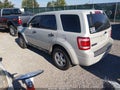 2009 Ford Escape — photo 3 of 16 | VIN 1FMCU02799KC79702