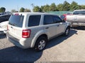 2009 Ford Escape — photo 4 of 16 | VIN 1FMCU02799KC79702