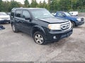 2011 Honda Pilot — photo 1 of 15 | VIN 5FNYF4H49BB058483