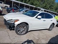 2015 Infiniti Q70 — photo 14 of 16 | VIN JN1BY1AR9FM561337