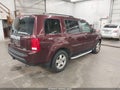2011 Honda Pilot — photo 4 of 16 | VIN 5FNYF4H42BB063914
