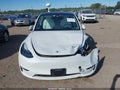 2023 Tesla Modelo Y — photo 13 of 21 | VIN 7SAYGAEEXPF647030