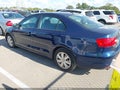 2014 Volkswagen Jetta — photo 3 of 11 | VIN 3VWD17AJ7EM262839