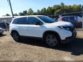 2020 Honda Passport — photo 13 of 16 | VIN 5FNYF8H52LB009319