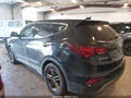 2017 Hyundai Santa Fe — photo 3 of 16 | VIN 5NMZT3LBXHH022452