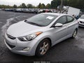 2013 Hyundai Elantra — photo 2 of 11 | VIN 5NPDH4AEXDH172931