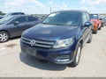 2014 Volkswagen Tiguan — photo 6 of 11 | VIN WVGAV3AX5EW594362