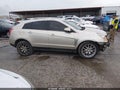 2014 Cadillac SRX — photo 14 of 17 | VIN 3GYFNCE37ES627000