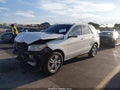 2013 Mercedes-Benz ML-Class — photo 2 of 16 | VIN 4JGDA5JB8DA214421