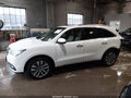 2016 Acura MDX — photo 15 of 17 | VIN 5FRYD4H47GB034209