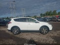 2017 Toyota RAV4 — photo 13 of 16 | VIN JTMRFREV3HJ171930