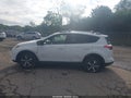 2017 Toyota RAV4 — photo 14 of 16 | VIN JTMRFREV3HJ171930