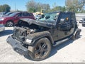 2023 Jeep Wrangler — photo 2 of 15 | VIN 1C4HJXEG8PW578207