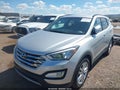 2014 Hyundai Santa Fe — photo 2 of 11 | VIN 5XYZU3LA8EG169346
