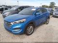 2018 Hyundai Tucson — photo 2 of 19 | VIN KM8J23A41JU644579