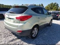2011 Hyundai Tucson — photo 4 of 11 | VIN KM8JU3AC0BU256679