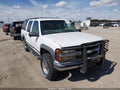 1999 Chevrolet Suburban — photo 1 of 16 | VIN 3GNGK26J6XG247122