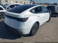 2026 Tesla Model Y — photo 4 of 17 | VIN 7SAYGDED6TF606333
