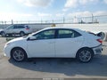 2015 Toyota Corolla — photo 14 of 16 | VIN 5YFBURHE7FP351200