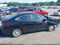 2018 Hyundai Accent — photo 13 of 16 | VIN 3KPC24A3XJE011488