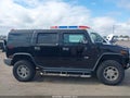 2004 Hummer H2 — photo 13 of 16 | VIN 5GRGN23U74H104923