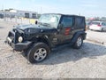 2009 Jeep Wrangler — photo 2 of 16 | VIN 1J4FA24189L759152