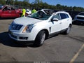 2013 Cadillac SRX — photo 2 of 16 | VIN 3GYFNCE3XDS650267