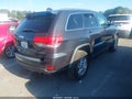 2015 Jeep Grand Cherokee — photo 4 of 18 | VIN 1C4RJEAG2FC231194