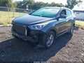 2017 Hyundai Santa Fe — photo 2 of 17 | VIN 5XYZU3LB2HG424022
