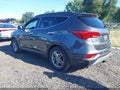 2017 Hyundai Santa Fe — photo 3 of 17 | VIN 5XYZU3LB2HG424022