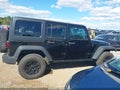 2016 Jeep Wrangler Unlimited — photo 13 of 16 | VIN 1C4BJWDG8GL155369