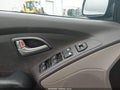 2010 Hyundai Tucson — photo 14 of 16 | VIN KM8JT3ACXAU040209