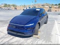 2026 Tesla Model Y — photo 2 of 22 | VIN 7SAYGDEE5TF604856
