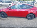 2026 Tesla Model Y — photo 13 of 19 | VIN 7SAYGDED4TA438625
