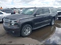 2015 Chevrolet Suburban 1500 — photo 6 of 16 | VIN 1GNSKJKC0FR712908