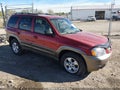 2001 Mazda Tribute — photo 1 of 16 | VIN 4F2CU08191KM10185