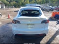 2023 Tesla Model Y — photo 14 of 14 | VIN 7SAYGDEE6PA207143