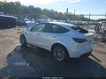 2023 Tesla Model Y — photo 3 of 14 | VIN 7SAYGDEE6PA207143
