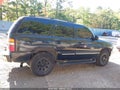 2001 Chevrolet Tahoe — photo 13 of 16 | VIN 1GNEK13T91J243319
