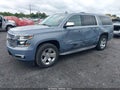2015 Chevrolet Suburban — photo 2 of 16 | VIN 1GNSKKKC7FR622211