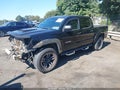 2013 Toyota Tacoma — photo 2 of 17 | VIN 5TFJU4GN1DX037914