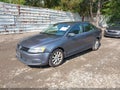 2014 Volkswagen Jetta — photo 2 of 11 | VIN 3VWD17AJ8EM409637