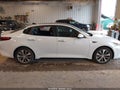 2018 Kia Optima — photo 12 of 16 | VIN 5XXGT4L31JG250608