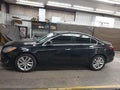 2014 Buick Regal — photo 14 of 16 | VIN 2G4GN5EX8E9293979