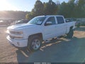 2018 Chevrolet Silverado 1500 — photo 2 of 16 | VIN 3GCUKREC7JG556581
