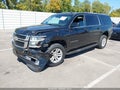 2015 Chevrolet Suburban — photo 2 of 16 | VIN 1GNSKJKC3FR197743