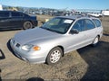 1999 Hyundai Elantra — photo 2 of 15 | VIN KMHJW25F9XU139859