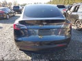 2024 Tesla Model Y — photo 17 of 21 | VIN 7SAYGDEE0RF166112
